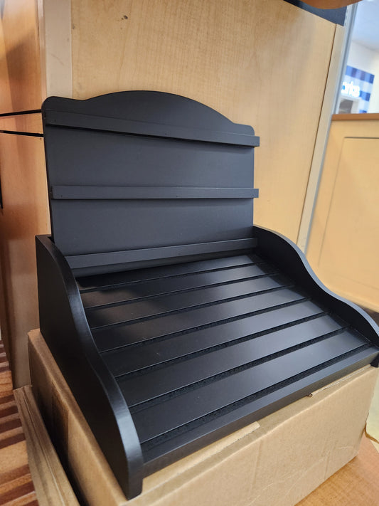 Inclined coin display